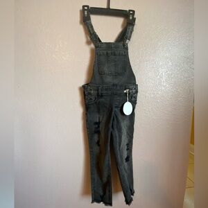Girls black denim overalls. Size 6.